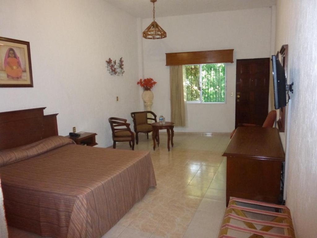 Hotel Bajo El Volcan Куэрнавака Экстерьер фото